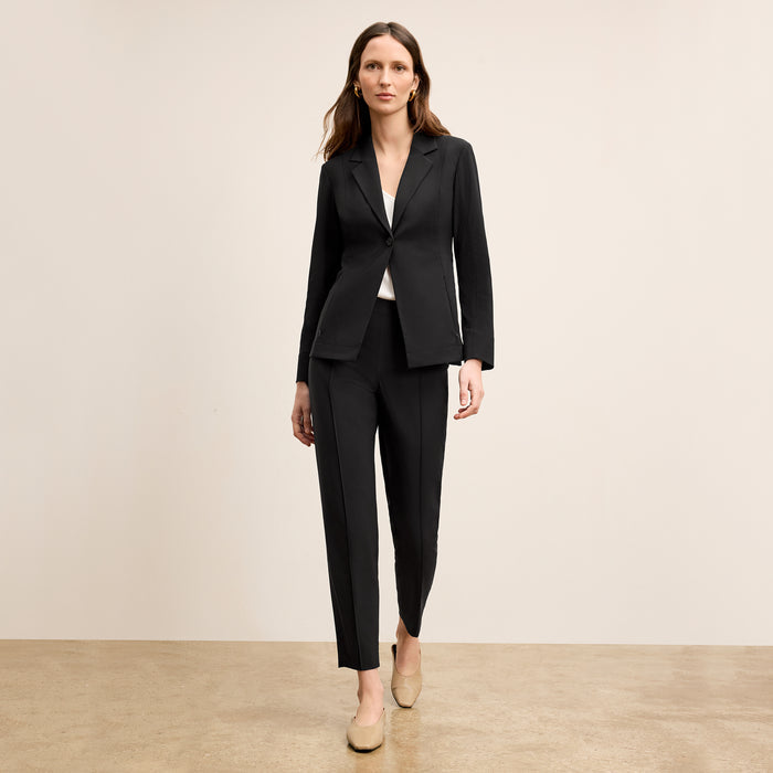 Front image of a woman wearing the Moreland jacket in Black