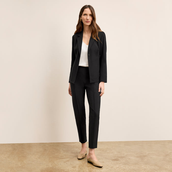 Front image of a woman wearing the Moreland jacket in Black