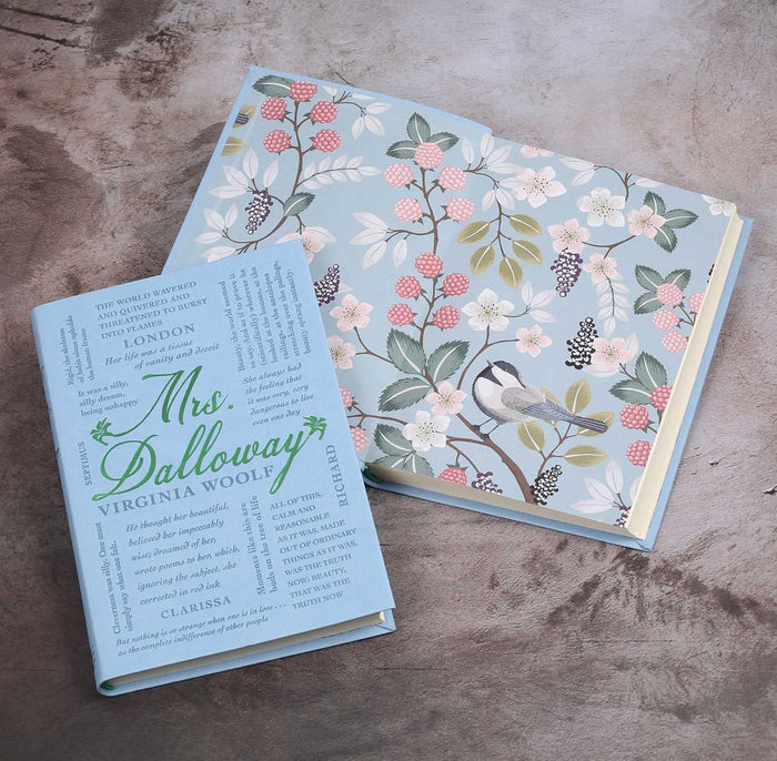 Book titled 'Mrs. Dalloway' by Virginia Woolf with floral design on a textured surface