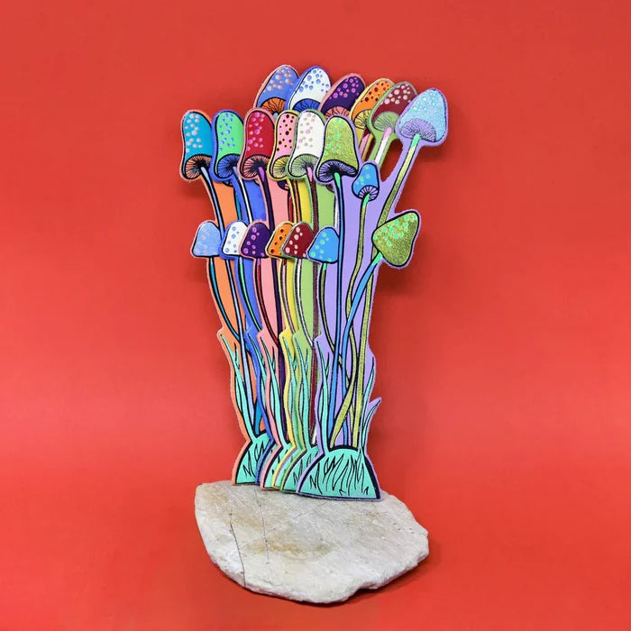 Colorful leather bookmarks shaped as mushrooms.