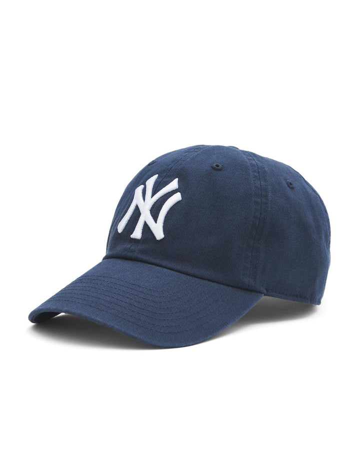 Navy Yankees cap with white embroidered logo by Suzy.