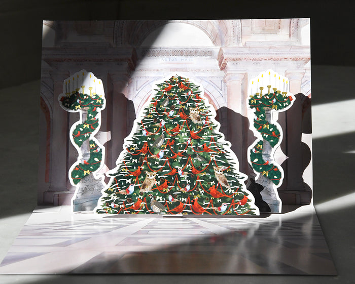 Pop-up  card featuring the Astor Hall decorated Christmas tree.