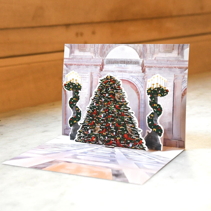 A different angle of the pop-up  card featuring the Astor Hall decorated Christmas tree.