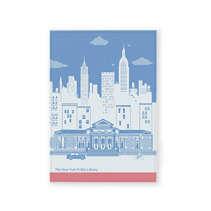 A tea towel with an illustration of The New York Public Library's Stephen A. Schwarzman Building and the city skyline in blue and red colors.