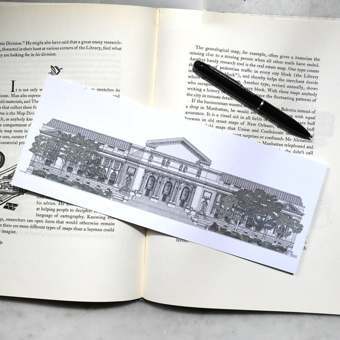 Panoramic postcard featuring an sketch of NYPL's flagship building on top of a book.