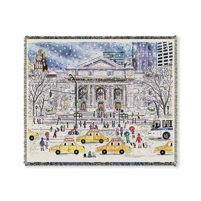 A throw blanket featuring an illustration of the New York Public Library's flagship Fifth Avenue location with people, taxis, and a snowy ground.