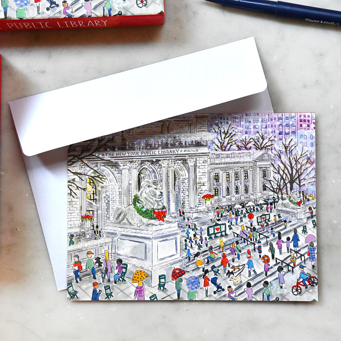 Illustrated card of a busy public library with people and books, featuring 'The New York Public Library' on a marble surface.
