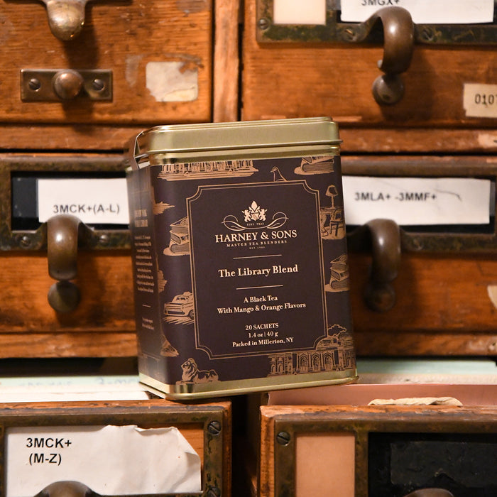 Harney & Sons tea canister on a wooden card catalog