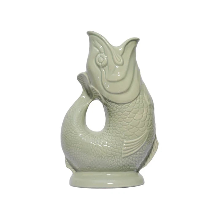 Sage green ceramic fish-shaped vase on a white background
