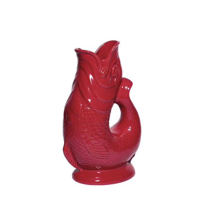 Cranberry ceramic fish-shaped vase on a white background
