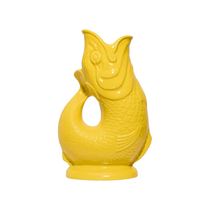 Yellow ceramic fish-shaped vase on a white background