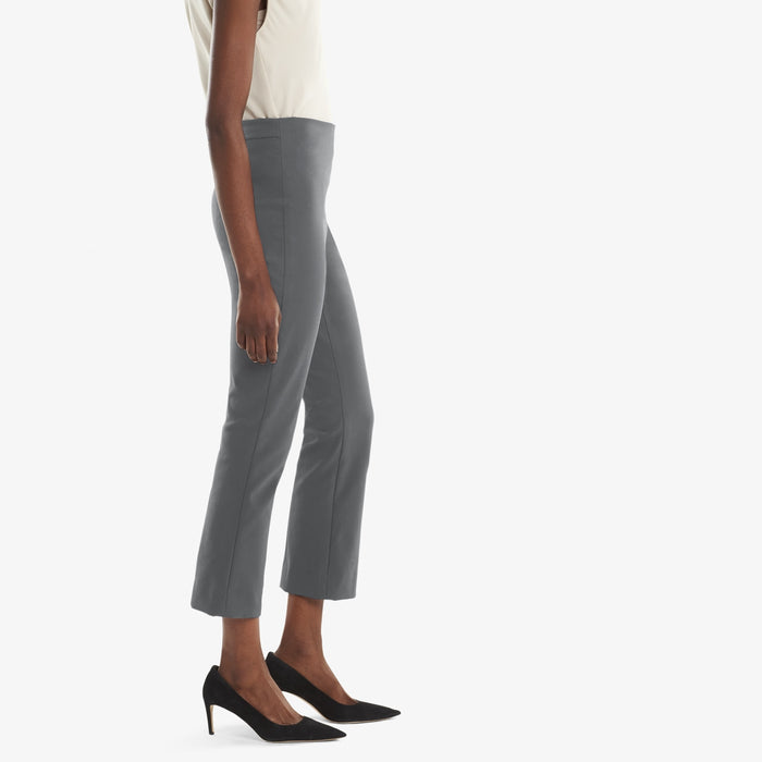 Side image of a woman standing wearing the Oshima pant in Monsoon | Exclude