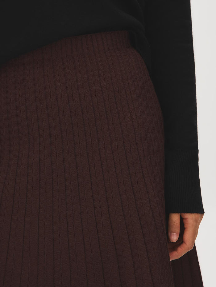 Brown Pleated Sweater Knit Mini Skirt - Close-up Fabric Detail - Suzy Shier
