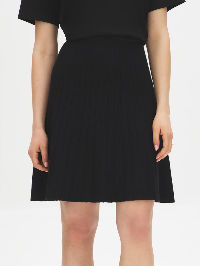 Black Pleated Sweater Knit Flippy Mini Skirt - Front View - Suzy Shier