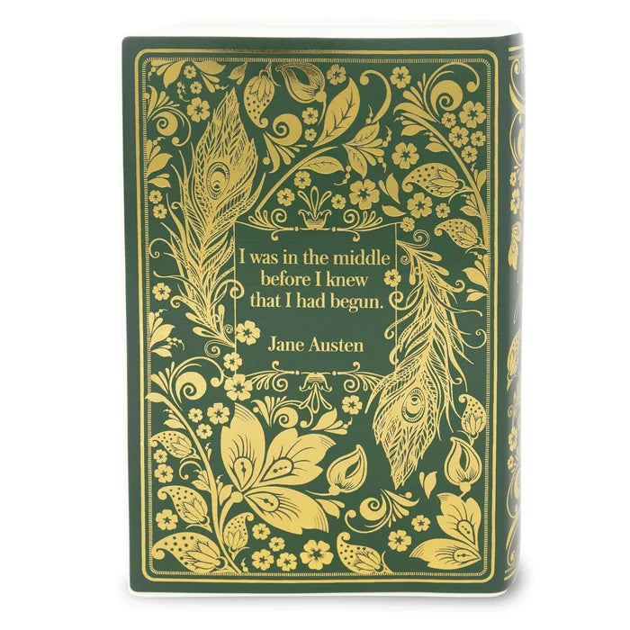 The back of the vase with a dark green cover decorated with ornate gold floral and peacock feather illustrations, featuring Jane Austen's quote in the center.