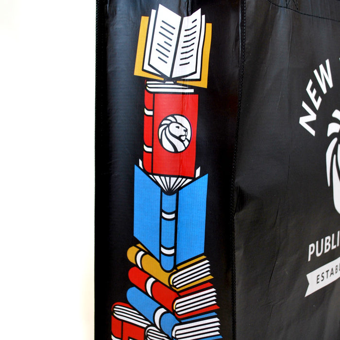 Close-up of the colorful book stack design on the gussets.