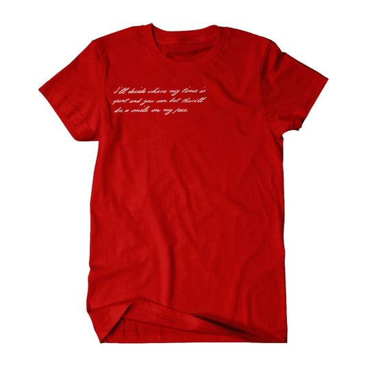 A Gorilla Biscuits red T-shirt with white cursive text on the chest—Ill decide where my time is spent and you can bet therell be a smile on my face—lays flat on a white background, celebrating personal choices and happiness.