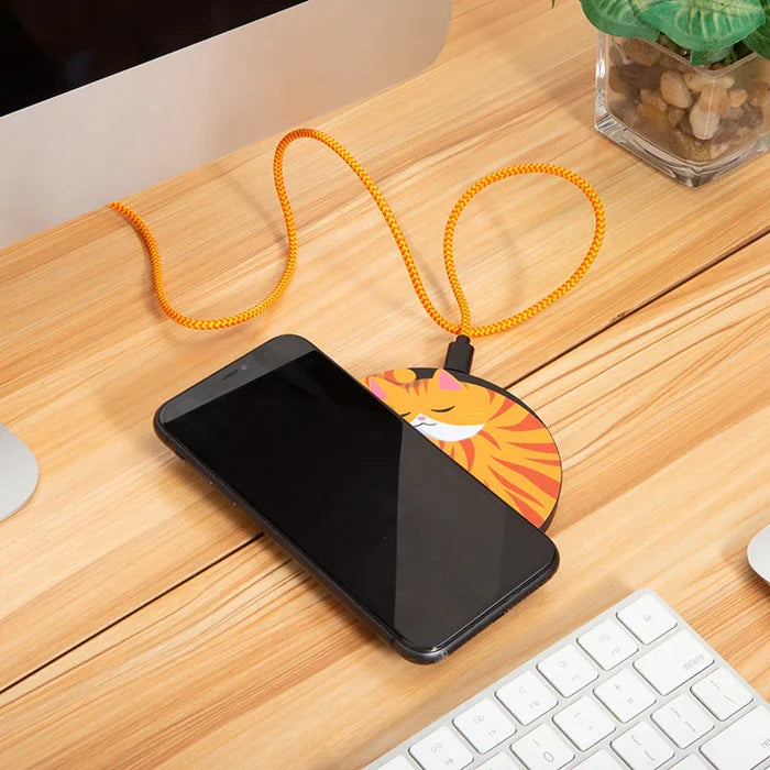 Smartphone with a colorful phone lanyard on a wooden desk