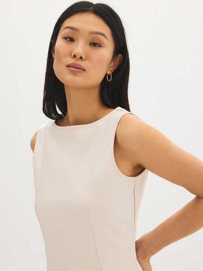 Sleeveless faux suede shell top with boat neckline by Suzy.