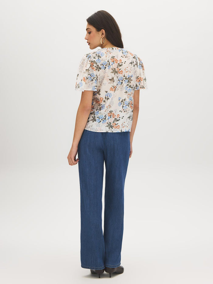 Winter White Floral Print Blouse with Smocked Shoulders - Back View - Suzy Shier