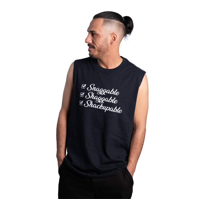 Man wearing a black sleeveless shirt with text on a white background