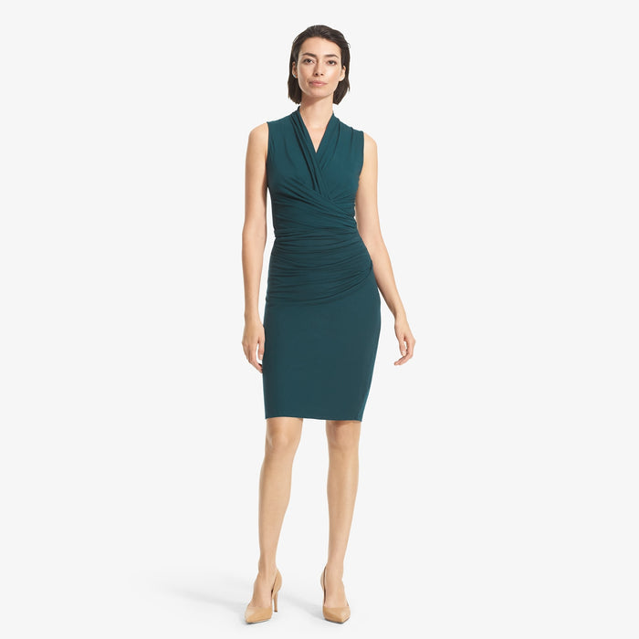 Front image of a woman standing wearing the Soho Skirt in Rainforest