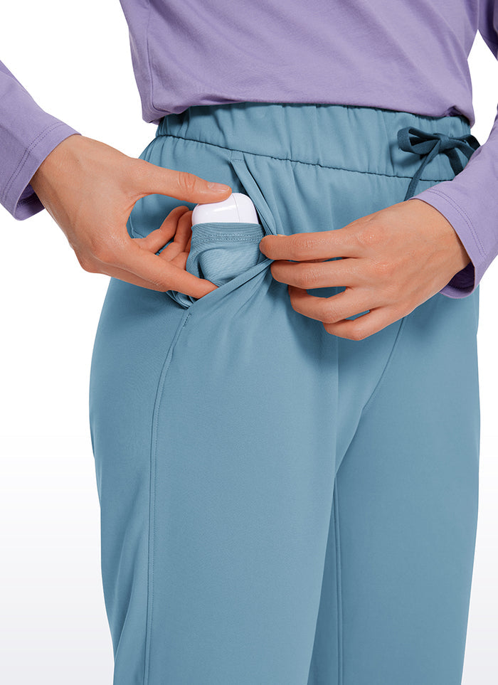 CRZ YOGA Women's Travel Slim Fit Stretch Drawstring 7/8 Pants 27'' Blue Ashes