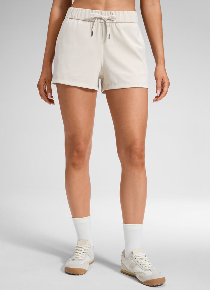 CRZ YOGA Women's Travel Stretch Mid-Rise Drawstring Shorts 2.5" Milky White