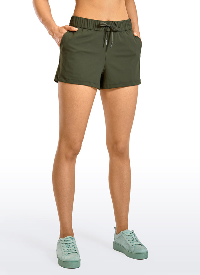 CRZ YOGA Women's Travel Stretch Mid-Rise Drawstring Shorts 2.5" Grey Olive