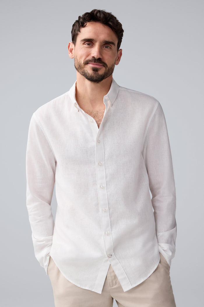 Front view of a man wearing Tech Linen Button Up in Bright White