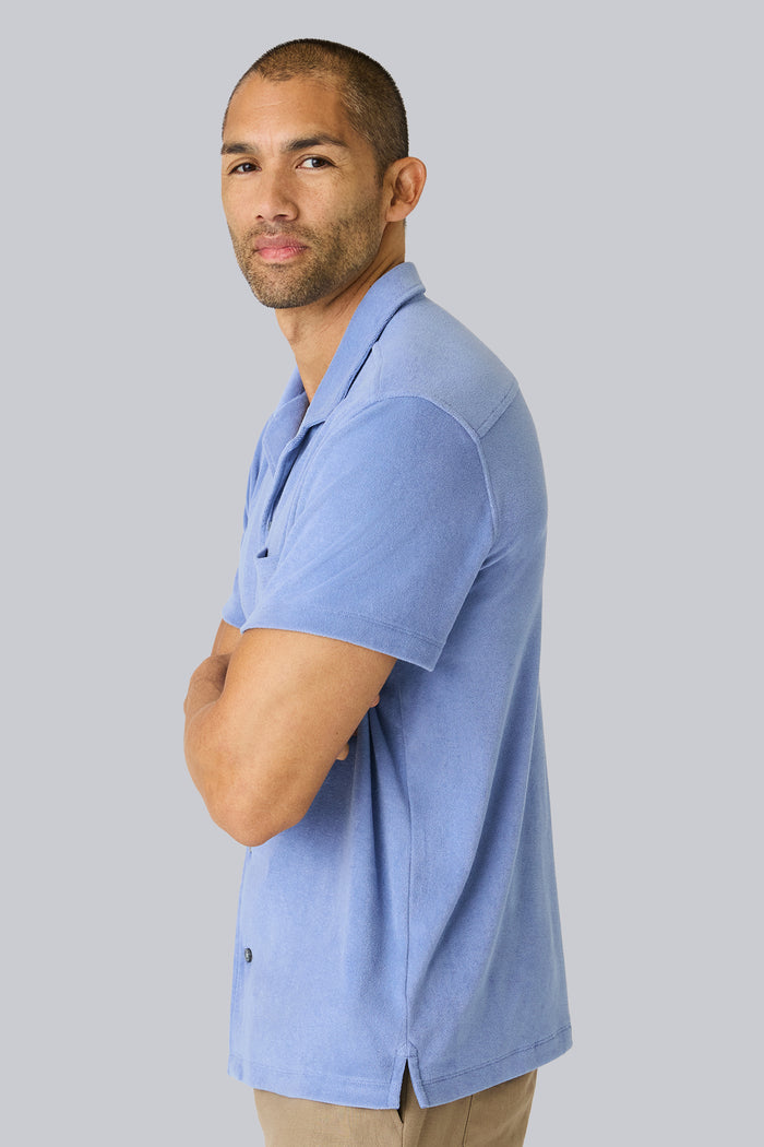 Side view of a man wearing Terry Cloth Short Sleeve Button Up in Desert Spring