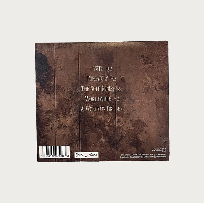 The back cover of The L.I.F.E. Project album displays a brown textured background, with song titles such as Ignite, Purgatory, and A World On Fire plus their durations listed vertically for an intriguing design.