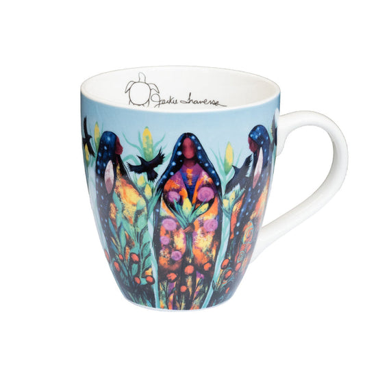 Colorful mug with artistic design on a white background