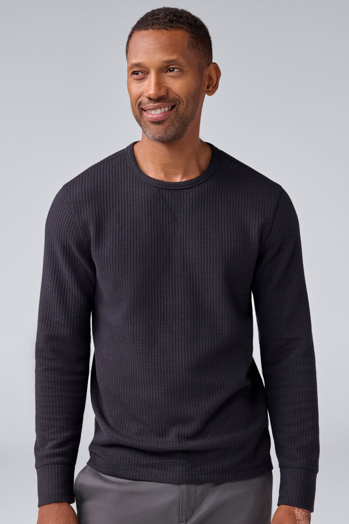 Front view of a man wearing Warmknit Waffle Crew in True Black