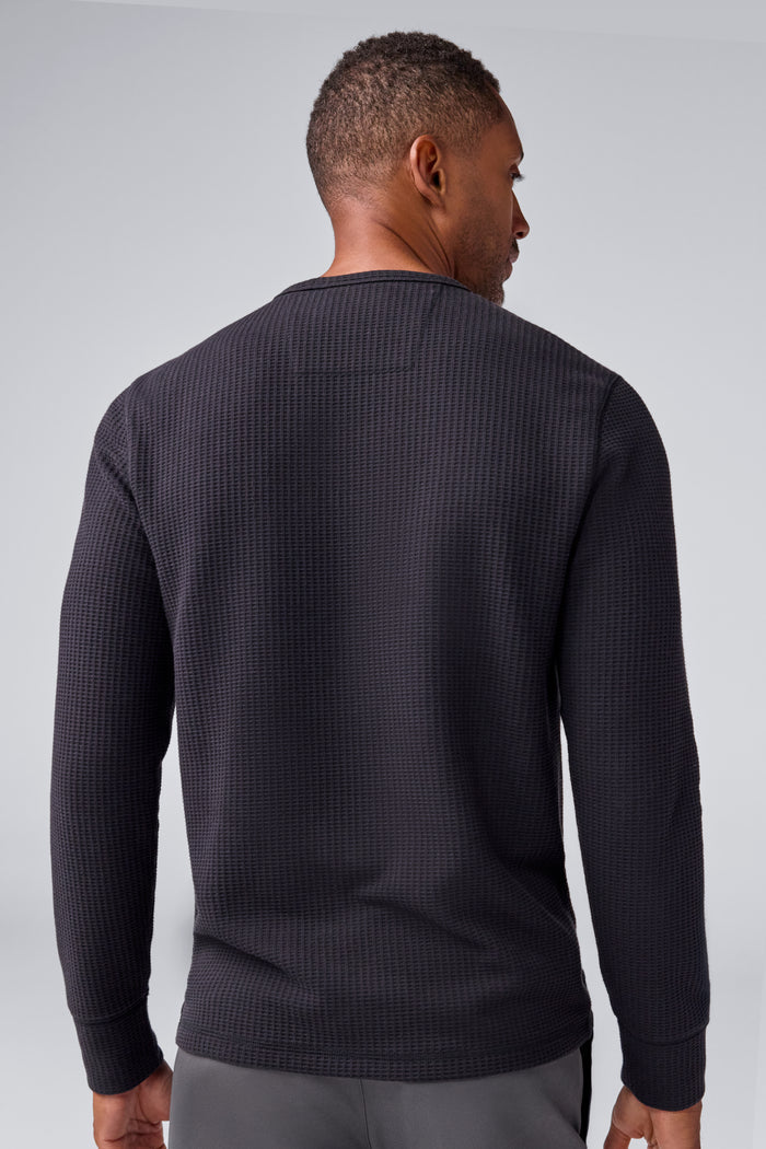 Back view of a man wearing Warmknit Waffle Crew in True Black