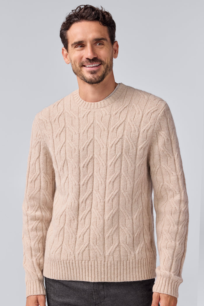 Front view of a man wearing WARMKNIT Wool Crew Neck Sweater in Oatmeal Heather