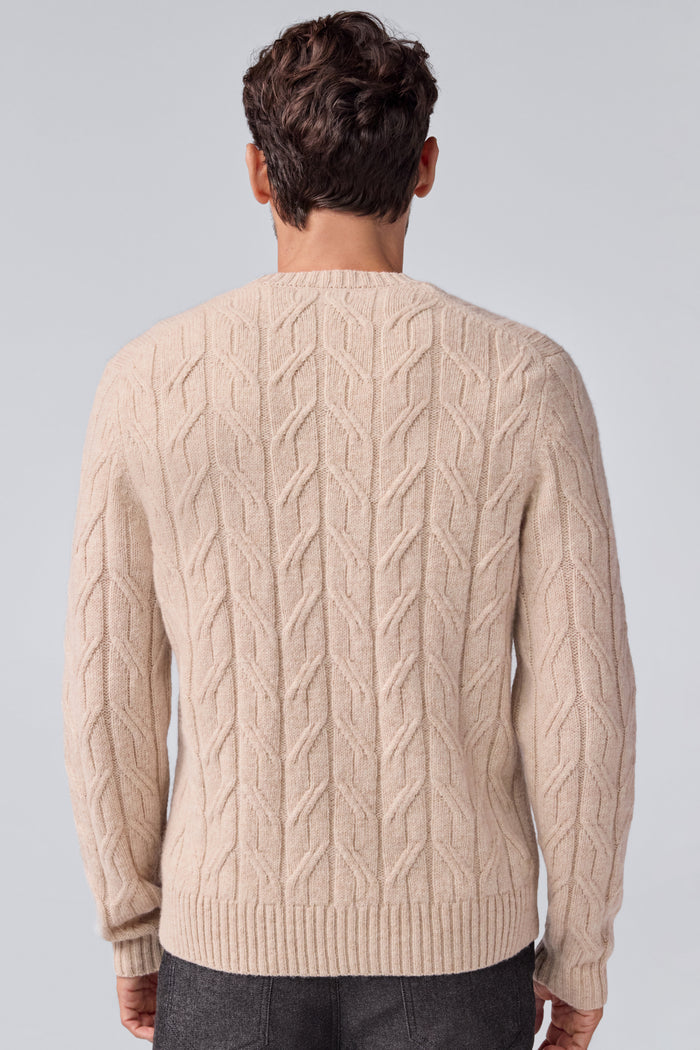 Back view of a man wearing WARMKNIT Wool Crew Neck Sweater in Oatmeal Heather