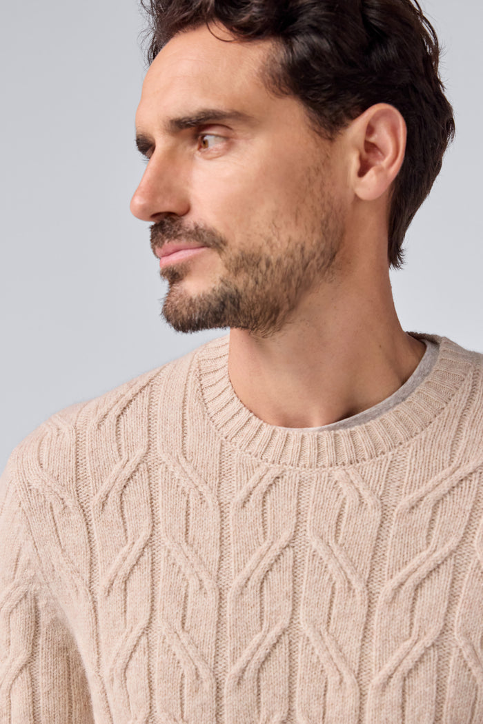 Detailed Front view of a man wearing WARMKNIT Wool Crew Neck Sweater in Oatmeal Heather