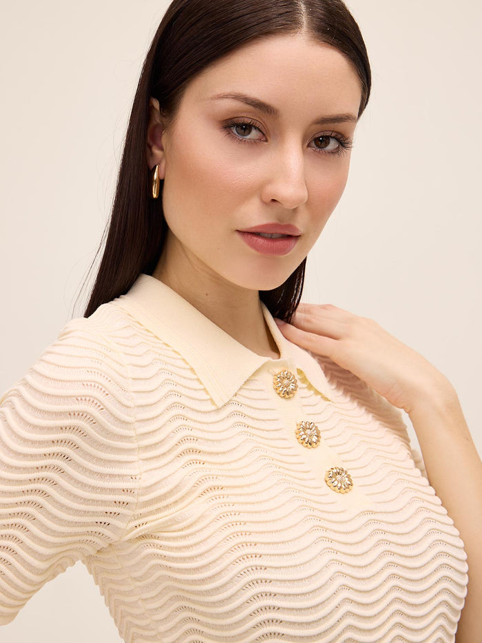 Wavy Ribbed Polo by Le Chateau.