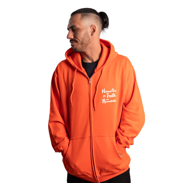 Man wearing an orange hoodie with text on a white background