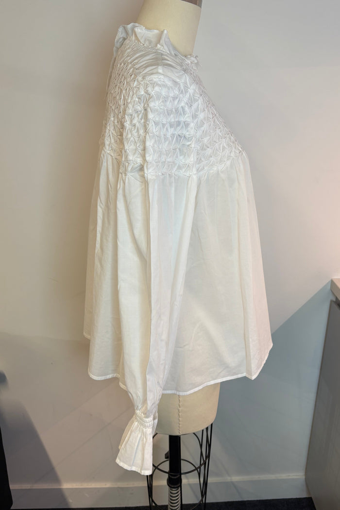 White Smocked Ruffle Blouse